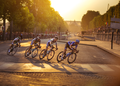 Cyclist Racing Through Paris For Tour De France .png